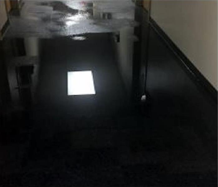 water covering flooring after leak