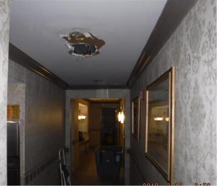 ceiling with water damaged, hanging materials