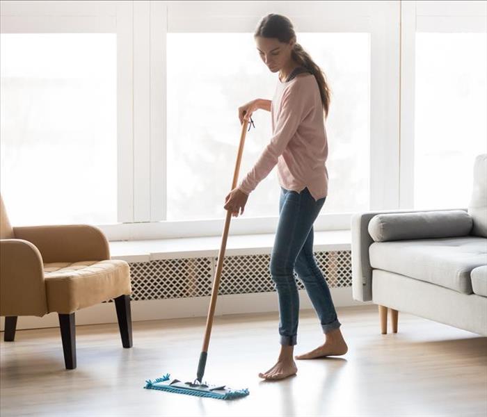 Woman cleaning home